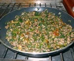 Cooking the lamb mixture.
