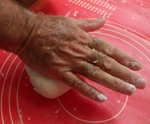 After mixing in the water the tortilla dough is kneaded for about 3 minutes until smooth and elastic.