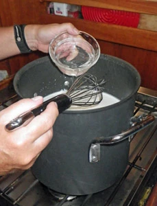 Rennet diluted in water is added to the milk.