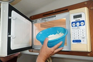 One method of warming the mozzarella prior to kneading is in the microwave. 