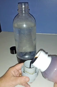 The flavor mixes come with a cap marked for varying sizes of bottles.