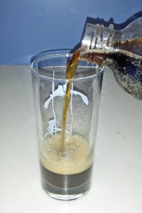 The freshly carbonated and flavored soda (in this case root beer) shows a good amount of fizziness.