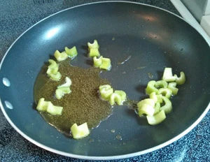 Sauteing celery for caponata.