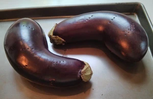 Eggplant are pierced before roasting.