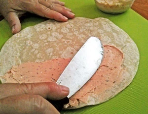 Spread the sticky layer all the way to the edges of the base layer