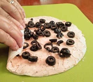 Roll up the base tightly, pressing down to help it stick together