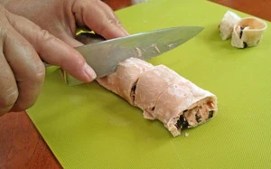 After trimming off the edges, cut into 1 inch slices