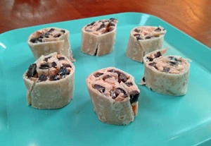 Serve on a pretty plate.  These are cream cheese flavored with tomato paste and Italian seasoning, topped with sliced olives.